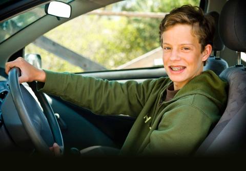 Teenage Boy Driving Car
